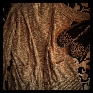 Tan cardigan with cheetah print slippers